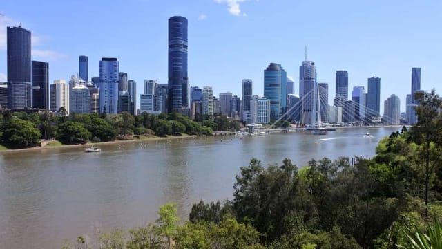Brisbane city skyline with river view.