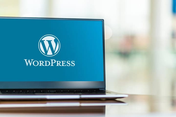 WordPress logo on laptop screen