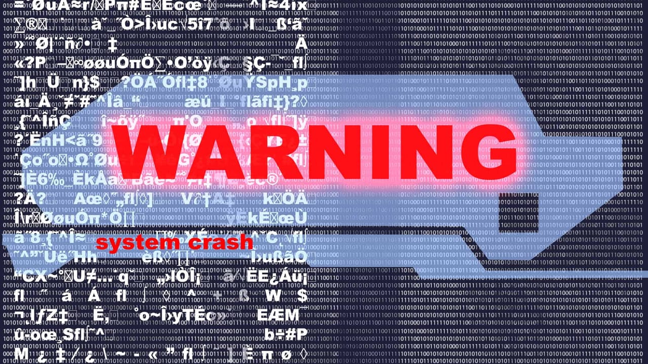 System crash warning with binary code background