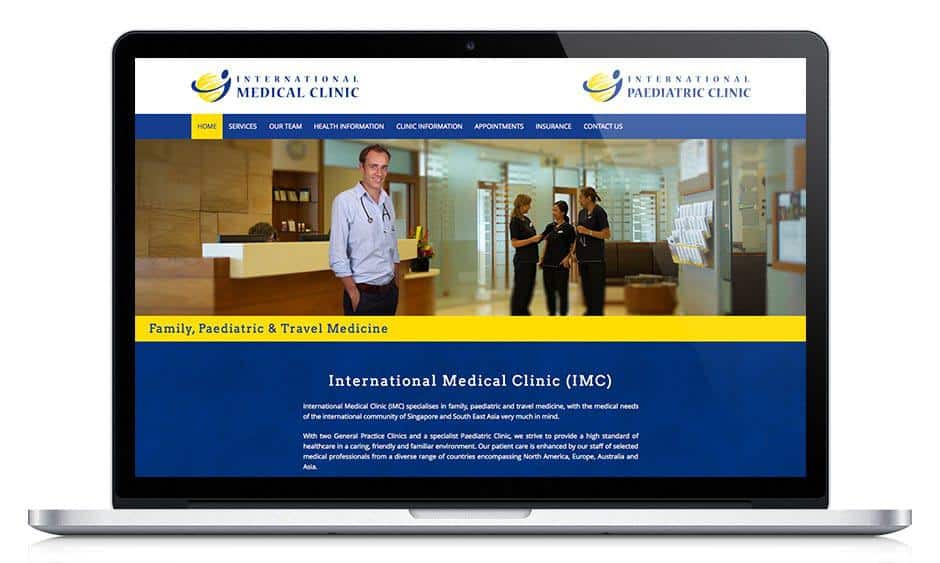 International Medical Clinic website displayed in MacBook screen