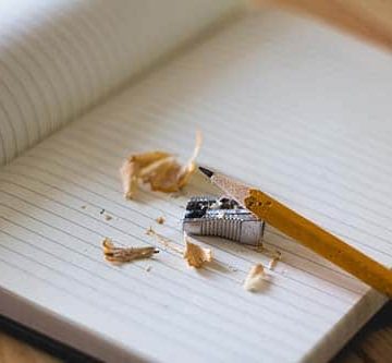 pencil and sharpener on notebook