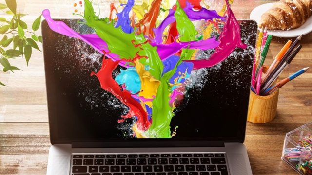 A computer screen awash with paint for the imagery that colours that enhance your website