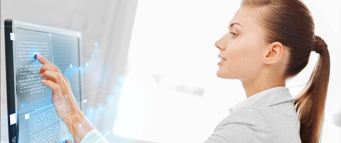 The One Reason to Pay Someone to Help with SEO—and It's Probably Not What You Think woman using a touch screen monitor