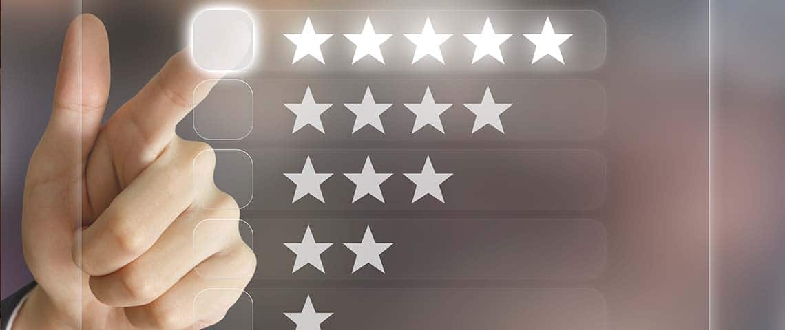 Business hand clicking customer reviews on virtual screen interface