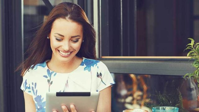 woman browsing a tablet