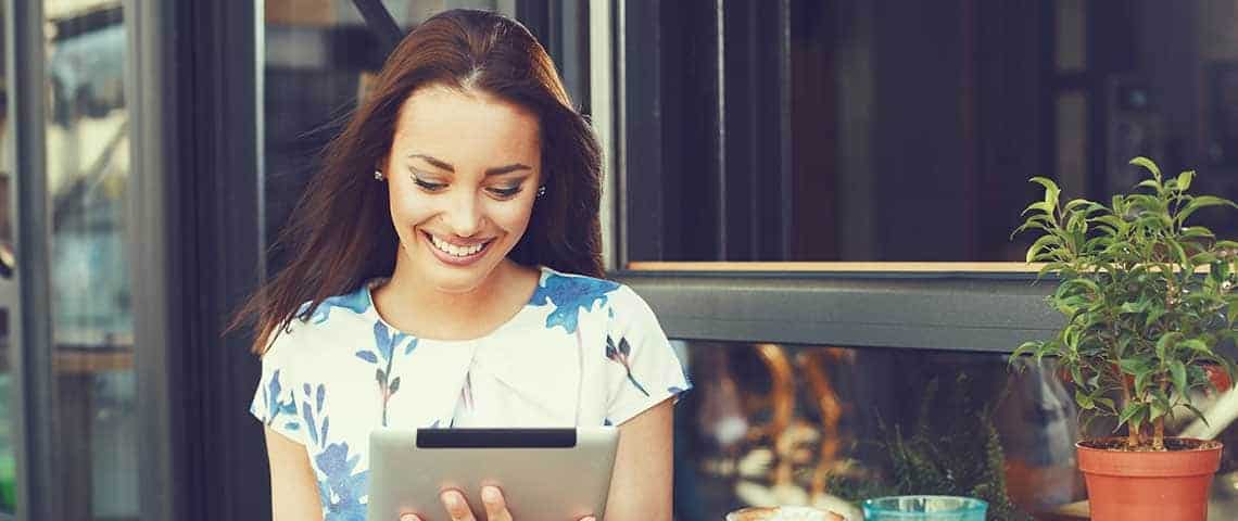 woman browsing a tablet