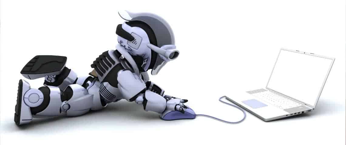 The dawn of the chatbot for business_featured robot using a laptop