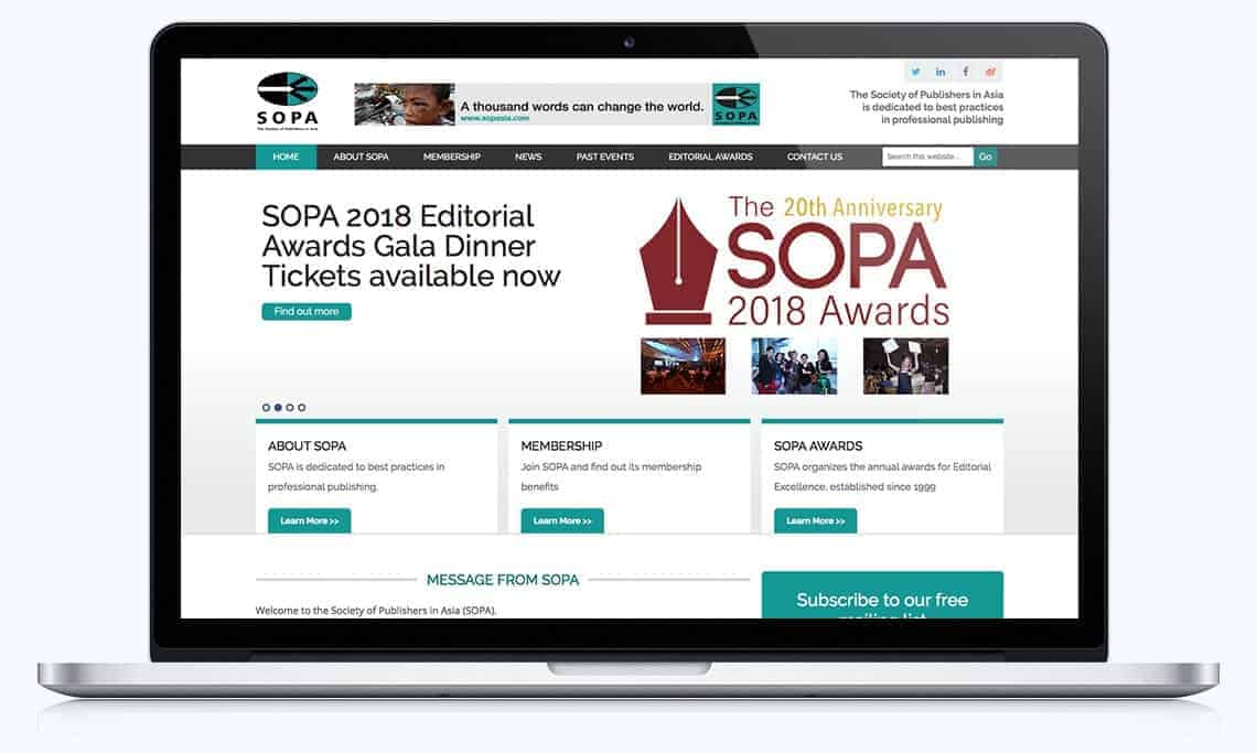 SOPA website displayed in MacBook screen
