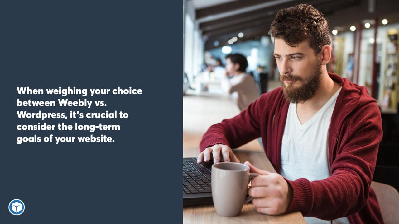 man working on his laptop in a cafe